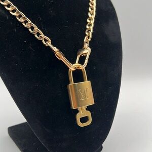 $300 Louis Vuitton Lock & Key
